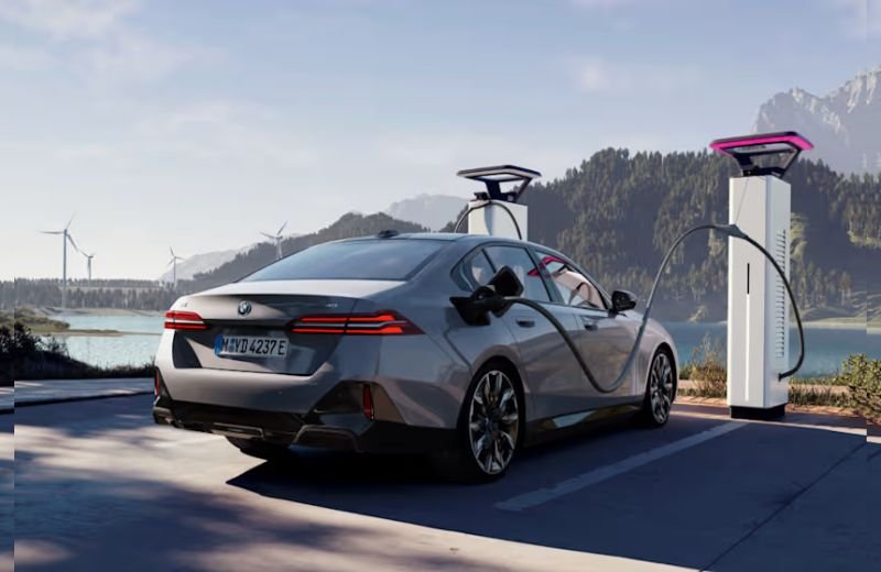 All BMW i5 EV Models Now Feature Tesla Style Charging Port